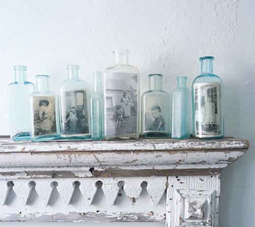 Collect memorable, old photos in glass bottles as a lovely feature in your home.